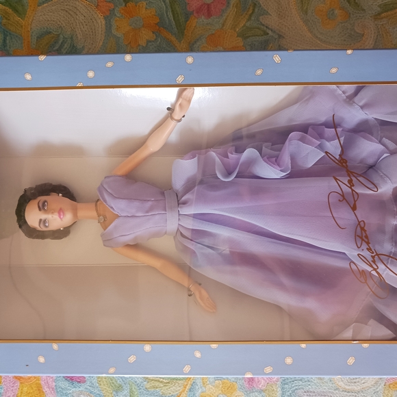 Elegant Purple Collectible Doll
